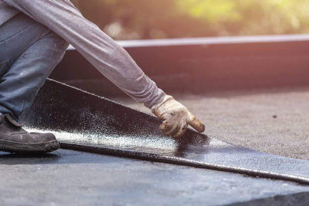 Professional Emergency Waterproofing technician working in Carson City, MI